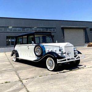 Voiture de luxe vintage électrique à quatre roues, bicolore blanc et noir, avec roue de secours, pour réceptions de mariage et excursions touristiques - Product Image 1