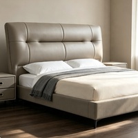 Lit moderne écologique en cuir véritable rembourré, cadre de lit en bois massif durable pour appartement et chambre d'hôtel