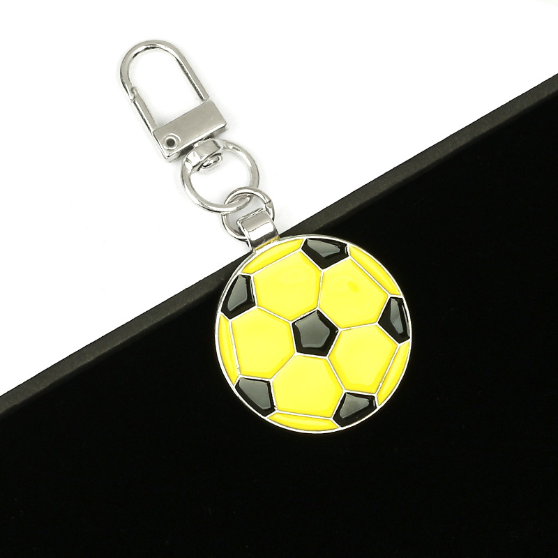 Loquet de porte style football/jaune et noir