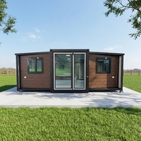 Maison conteneur modulaire de 20 pieds avec panneau mural étanche à cadre personnalisé, aménagement intérieur flexible, double aile inclinée, appartement/hôtel/villa