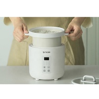 Conception ronde Mini taille 1.2L portable contrôle tactile ménage mini cuiseur à riz électrique adapté à une utilisation de 2 personnes