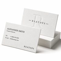 Cartes de visite en papier coton épais 700 g/m² avec impression couleur, gaufrage à sec, logo en relief, recto-verso, design différent