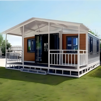 Maison conteneur de luxe haut de gamme de 40 pieds à double aile extensible, villa préfabriquée complète avec intérieur pliable pour complexe hôtelier