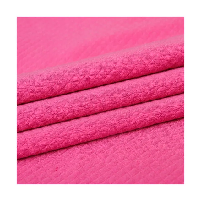 2022 공장 고품질 실내 장식품 직물 폴리에스테 자카드 직물 의복과 장난감을 위한 누비질된 분홍색 직물