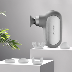 Pistola de Masaje Fascial Mini de Silicona, Nueva, con Vibración de Percusión Profunda, con Calor, con 5 Cabezales de Masaje - Product Image 1