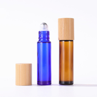 Flacon en verre à bille de 5 ml et 10 ml, transparent, ambré ou bleu, avec couvercle en bambou, pour huile essentielle, massage, huile corporelle