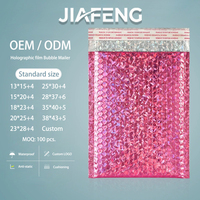 Pochette d'expédition à bulles en feuille métallique laser rose à faible MOQ avec effet holographique irisé pour l'expédition d'articles fragiles