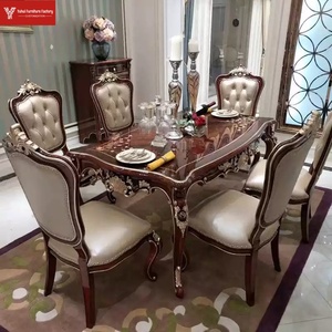 Ensemble de meubles sculptés en bois massif de style européen pour une salle à manger de villa luxueuse, comprenant une <span class=keywords><strong>table</strong></span> et <span class=keywords><strong>six</strong></span> chaises - Product Image 1