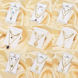 Großhandel günstige Frauen Mädchen Edelstahl-Schmuck 18k Gold gefüllte Halskette Anhänger und Stecker Ohrringe Schmuck-Set