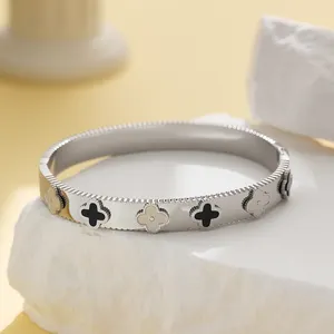 Bracelet Bangle XIXème de créateur de marque célèbre personnalisé trèfle à quatre feuilles en acier inoxydable plaqué or 18K bijoux tendance en vente en gros