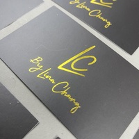 Cartes de visite personnalisées haut de gamme au design minimaliste noir et or pour les vendeurs
