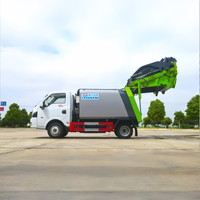 Camion compacteur de déchets Dongfeng Tuyi 3m³ 4x2 avec plaque bleue pour l'élimination des déchets en garage souterrain