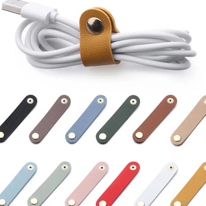 Venta directa de fábrica de organizador de cables para auriculares de cuero PU con hebilla creativa para gestión de cables, cable portátil para auriculares - Product Image 1