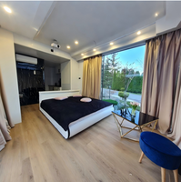 Système de maison capsule spatiale à double étage de luxe, hôtel mobile de plage, maison d'hôtes, conteneurs habitables, supermarché, immeuble de bureaux, magasin en acier