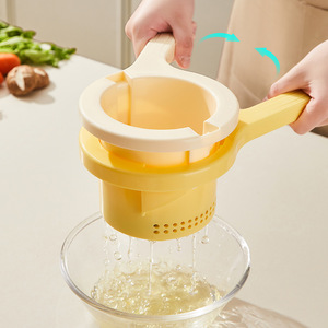 Presse manuelle rotative pour légumes, idéale pour la préparation de raviolis et comme déshydrateur de jus - Product Image 2