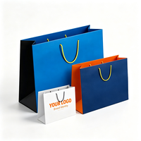 Sac cadeau élégant en papier artistique personnalisé avec poignée en corde, sac fourre-tout en papier mat noir, blanc, vert, vente en gros, pour la promotion de la marque
