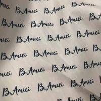 100% Polyester Logo Imprimé Peau De Pêche Microfibre Tissu Tissé Motif Brossé Caractéristique Résistant Aux Rides Filles Vestes Bagages