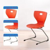 Ensemble de bureaux et chaises en bois pour écoles primaires, avec siège individuel en plastique et boîte à livres, idéal pour l'étude à domicile ou en classe.