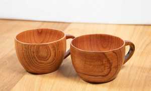 Tasse à thé en bois naturel, fabriquée à la main pour une utilisation quotidienne, offrant une durabilité écologique et un look chaleureux inspiré de la terre - Product Image 6