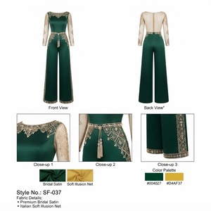 Elegante Mono Verde Esmeralda para la Noche con Mangas Largas Transparentes, Cinturón con Cristales y Silueta Estructurada y Elegante - Product Image 1