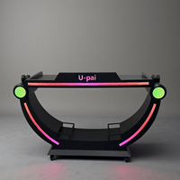 Station DJ de style technologique moderne avec éclairage RGB, logo lumineux personnalisé, table de DJ avec découpe de circuit imprimé pour clubs, salons et événements