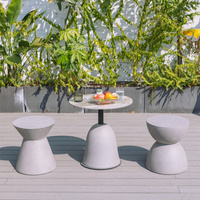 Mobilier d'extérieur rond gris béton GFRC Table basse et chaise avec résistance à l'eau parfaite
