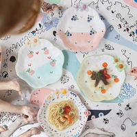 Creatief Kawaii Eco-vriendelijk porseleinen dessertbord van voedselveilige kwaliteit, onregelmatig gegraveerd, handgeschilderd fruit-salade ontwerp, 3D bloem