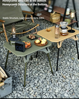 Table de camping pliable en plastique réglable en hauteur, légère et compacte, idéale pour pique-nique, barbecue et excursions en voiture.