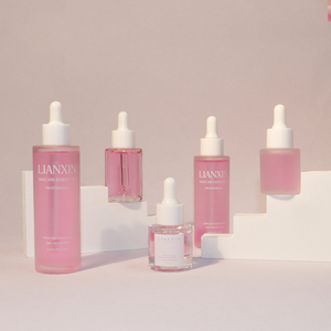 Flache Schulter Milchglas Tropf flasche 1 Unze 100ml Rosa und Weiß Transparente Hautpflege Ätherisches Öl Essenz Klare Flasche - Product Image 1