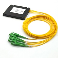 Splitter Fiber Optik PLC Tipe Kotak ABS 1*4 Single Mode dengan Konektor SC/APC untuk Penggunaan FTTX/FTTH