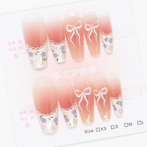 Vente en gros usine : Nouveaux faux ongles d'été mignons, prêts à poser, faciles à appliquer directement sur les doigts - Product Image 3