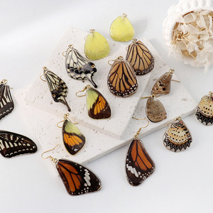 CAIOOCHE Boucles d'oreilles pendantes en forme d'ailes de papillon réelles, en acier inoxydable incrusté de résine UV, pour femmes - Product Image 2