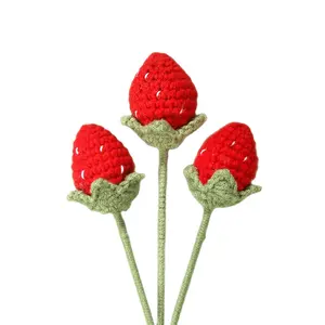Handmade woolen crocheted knitted finished product strawberry simulation holding flowers