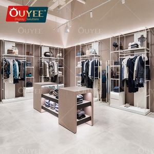 ชั้นวางเสื้อผ้าสีทองสำหรับโชว์เสื้อผ้าดีไซน์ภายในร้านเสื้อผ้าออกแบบได้ตามต้องการ - Product Image 2