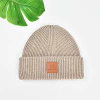 Parche de cuero con logotipo personalizado, gorro de punto de lana cálido con puños, gorros de invierno Unisex, gorro para mujeres y hombres