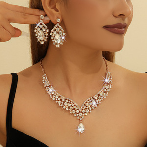 European and American Hot Sale Gold Zinc Alloy Inlaid White Rhinestone Metal Pearl Necklace Earrings Set Women Jewelry - Product Image 1