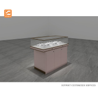 Vitrine à bijoux en métal doré avec logo personnalisé, éclairage LED, design moderne et écologique pour les magasins de bijoux commerciaux