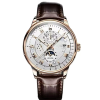 Montre de luxe pour homme à cadran en verre quartz, bracelet en cuir, boîtier en alliage, avec breloque lune ciel étoilé 20 mm et calendrier à trois aiguilles, livrée en coffret