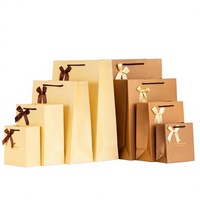 Sacs cadeaux en papier couché personnalisés avec poignées et nœuds en ruban pour le shopping et l'emballage – Offre Spéciale