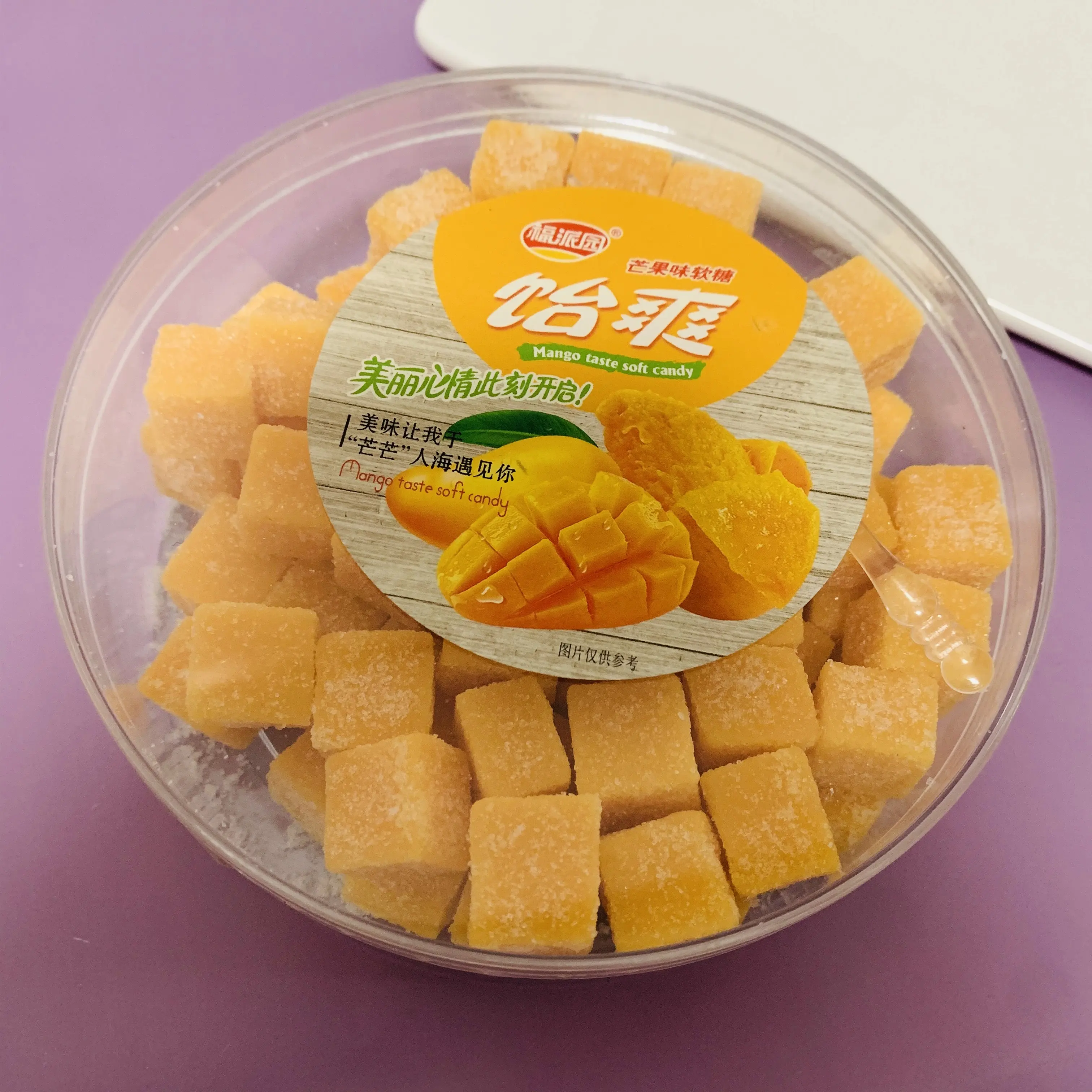 Fabrika doğrudan tedarik meyveli yumuşak şeker Mango lezzet şeker kaplı yumuşak sakızlı şeker rahat tatlı aperatifler çay tatlılar