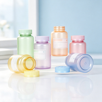 Bouteille en plastique transparent givré multicolore de qualité alimentaire, bouteille transparente mate en PET pour emballer des pilules, des capsules et des comprimés