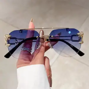 Gafas Kenbo, venta al por mayor, gafas de sol sin montura de leopardo, novedad de 2024, gafas de sol de estilo Unisex para hombres y mujeres