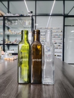 Venta caliente 100mL 250ml 500ml 750ml 1000ml Botella de aceite de oliva de vidrio cuadrada vacía con tapa para aceite de oliva Aceite de cocina