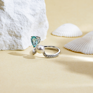 Anillo de oro de 18 quilates con dos piedras de aguamarina de laboratorio en forma de pera, modelo MSR-1633 de Messi Jewelry. - Product Image 3