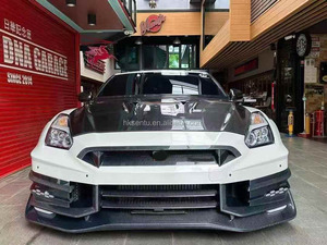 ชุดแต่งสไตล์ Top Secret ปี 2024 สำหรับรถยนต์นิสสัน GTR R35 ประกอบด้วยกันชนหน้า-หลัง สปอยเลอร์ ฝาครอบเครื่องยนต์ และสเกิร์ตข้าง สำหรับชุดแต่ง GTR R35 - Product Image 4