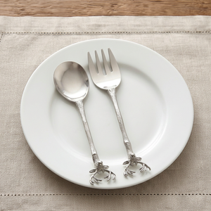 Elegante juego de cubiertos de acero inoxidable con mango de diseño y acabado plateado, perfecto para restaurantes, bodas y cenas de alta gastronomía. - Product Image 1