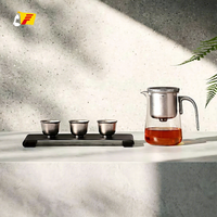 Bouteille à thé portable en verre à attraction magnétique avec infuseur filtrant à une touche, grande capacité, style minimaliste, thé de qualité supérieure
