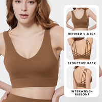 Soutien-gorge de sport à armatures amovibles, couleur unie, décolleté en V profond, bretelles fines entrelacées pour un maintien intensif