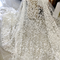 Nouveau design de tissu de broderie en tulle et dentelle à paillettes florales pour robe de mariée