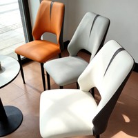 Chaise de salle à manger en cuir minimaliste moderne, design nordique à dossier creux, mobilier de maison disponible en orange, gris clair, blanc